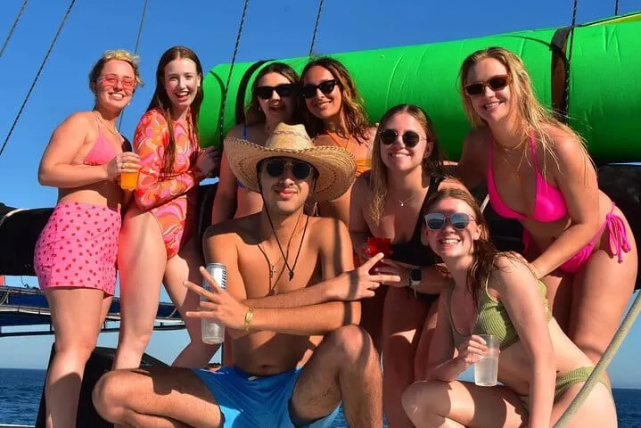 Party in the sun with friends on the front deck of your Los Cabos catamaran, featuring an open bar and music!