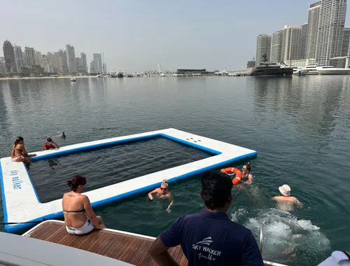Dubai Ride & Slide Yacht Cruise with BBQ, Snorkeling & Pool