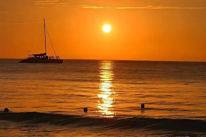 Witness the Caribbean sunset explode in color and capture the perfect golden hour photo on your Montego Bay Sunset Catamaran Cruise!
