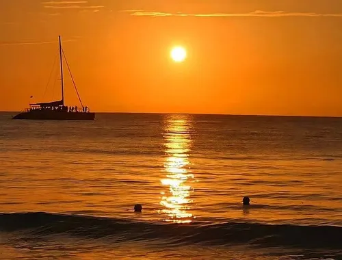 Witness the Caribbean sunset explode in color and capture the perfect golden hour photo on your Montego Bay Sunset Catamaran Cruise!