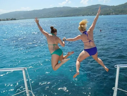 Sun, snorkeling, and an open bar—all set to the beat of a live Reggae DJ on your Montego Bay catamaran tour!