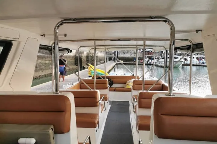 Superior style of boat that features a club-seating layout and is specifically designed for sightseeing tours, not just people movers