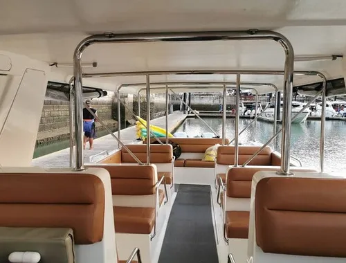 Superior style of boat that features a club-seating layout and is specifically designed for sightseeing tours, not just people movers