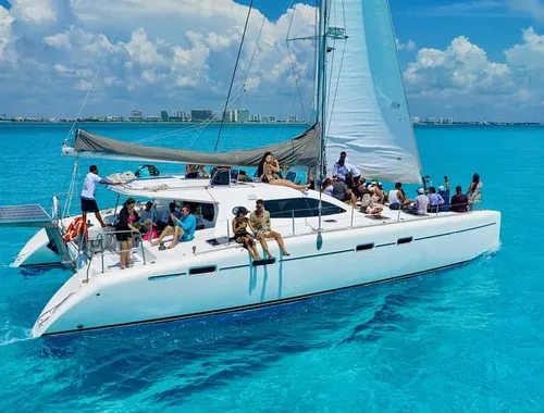 Join the ultimate Spring Break Party Catamaran to Isla Mujeres! Sail on the stunning Caribbean Sea, snorkel in vibrant reefs, and enjoy non-stop fun, music, and the best party vibes on the water!