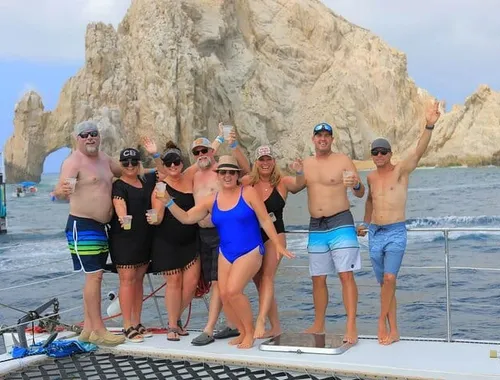Cheers to Cabo! Celebrate with friends and a cocktail on deck as you pose with the incredible, iconic El Arco rock formations at Land's End.
