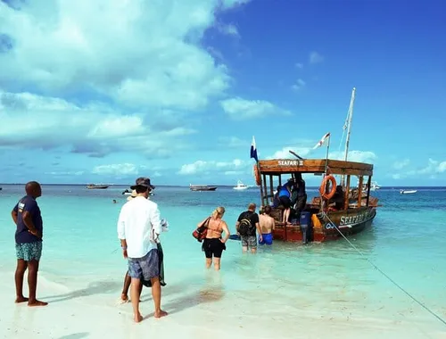 Mnemba Island Private Boat – Snorkel & Dolphin Adventure