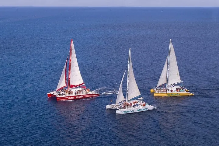 Party on the water: Sail, snorkel, and groove to a Reggae DJ with an open bar on a Montego Bay catamaran!