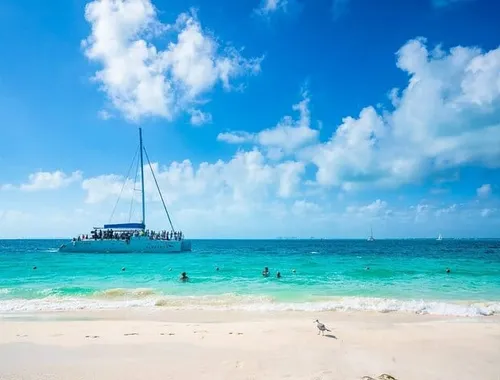 Isla Mujeres 4-in-1 Catamaran: Snorkel, Beach Club & Open Bar