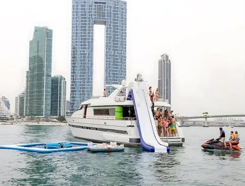 Dubai Ride & Slide Yacht Cruise with BBQ, Snorkeling & Pool