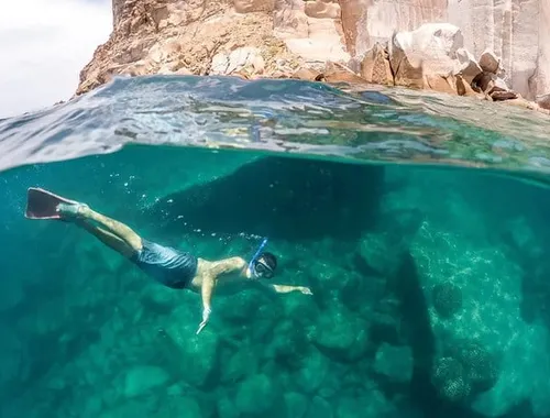 Los Cabos Snorkeling Tour by Boat with Open Bar and Music