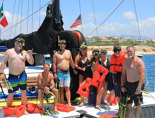 Sun, friends, and fun: Get ready to snorkel and party with an open bar on this exciting Los Cabos catamaran cruise!