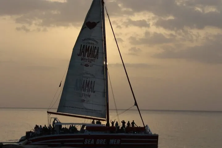 Sun-soaked fun! Join the party on a Montego Bay catamaran for snorkeling, an open bar, and a Reggae DJ.