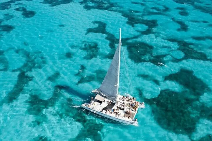 Isla Mujeres 4-in-1 Catamaran: Snorkel, Beach Club & Open Bar