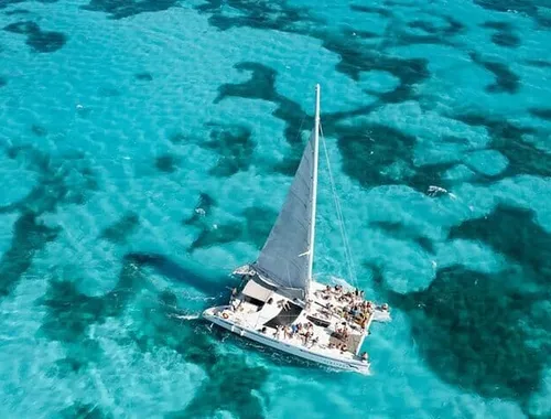 Isla Mujeres 4-in-1 Catamaran: Snorkel, Beach Club & Open Bar