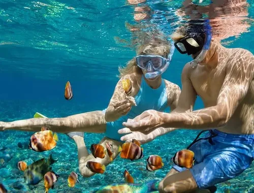 Isla Mujeres 4-in-1 Catamaran: Snorkel, Beach Club & Open Bar