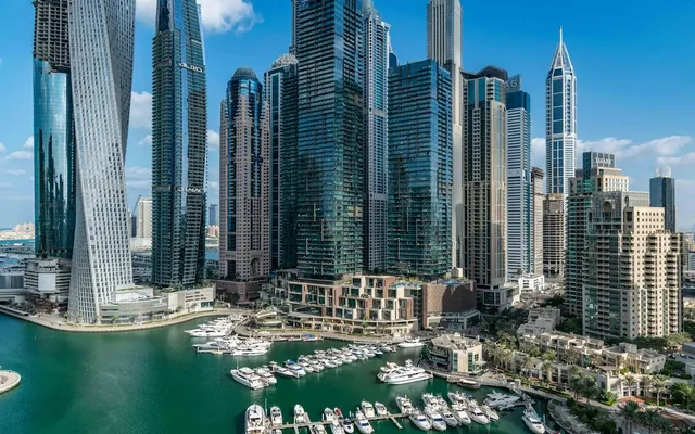 Dubai Marina towers and moored yachts