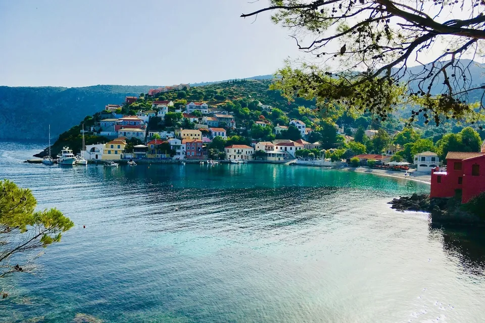The village and bay of Assos, Kefalonia. Photo via Unsplash