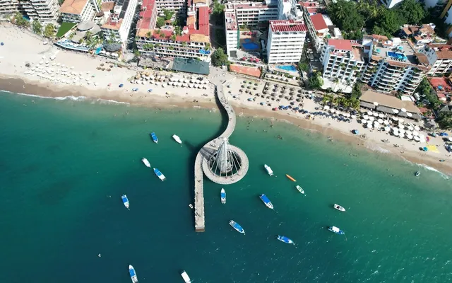 Aerial view of the Puerto Vallarta coast and boats on Banderas Bay