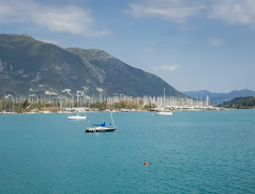 Sailboats in a bay with mountains, Ionian Sea