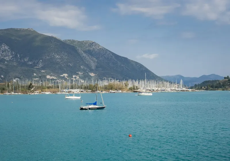 Sailboats in a bay with mountains, Ionian Sea