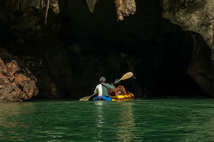 Kayaking into a cave in Phang Nga Bay